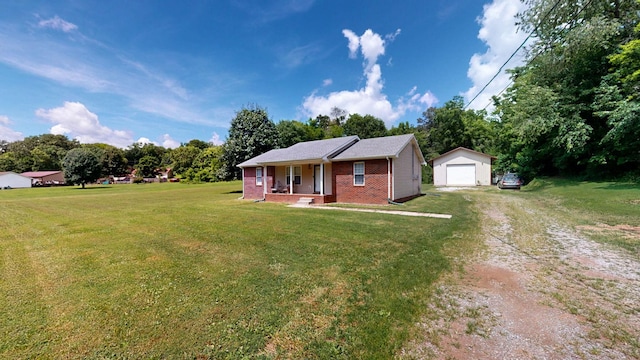 1726 Old Clarksville Pike, Chapmansboro, TN 37035 - ranch-style home featuring covered porch, an outdoor structure, a garage, dirt driveway, and a front lawn