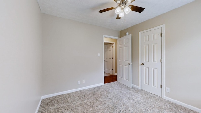 1726 Old Clarksville Pike, Chapmansboro, TN 37035 - unfurnished bedroom featuring carpet and a ceiling fan