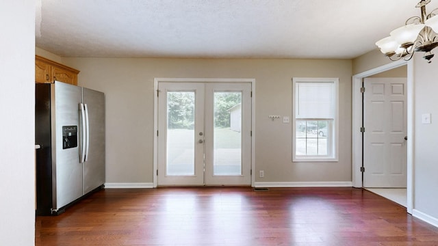 1726 Old Clarksville Pike, Chapmansboro, TN 37035 - doorway to outside with dark wood finished floors, a chandelier, and french doors