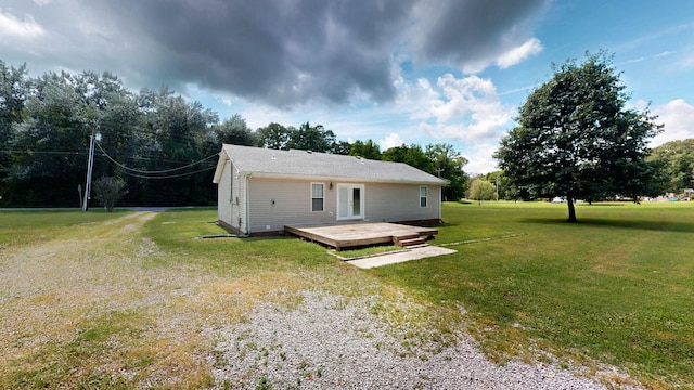 1726 Old Clarksville Pike, Chapmansboro, TN 37035 - back of property with a deck and a yard