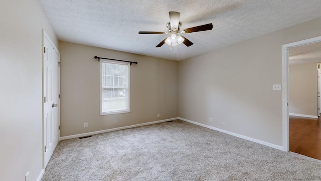 1726 Old Clarksville Pike, Chapmansboro, TN 37035 - spare room with carpet floors, ceiling fan, and a textured ceiling