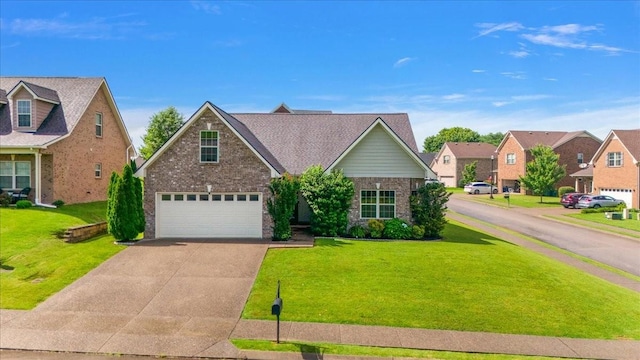 3028 Honeysuckle Dr, Spring Hill, TN 37174 - traditional home featuring driveway, a garage, a front lawn, and brick siding
