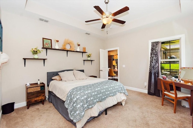 3028 Honeysuckle Dr, Spring Hill, TN 37174 - bedroom featuring light colored carpet, a raised ceiling, ceiling fan, and a desk
