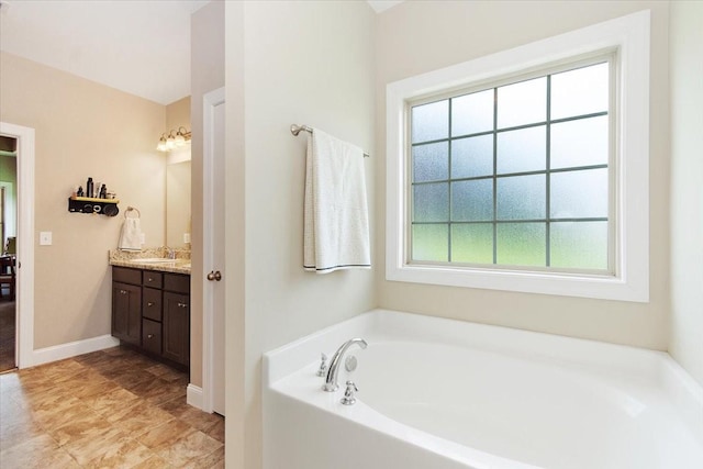 3028 Honeysuckle Dr, Spring Hill, TN 37174 - full bath featuring vanity and a garden tub
