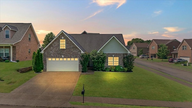 3028 Honeysuckle Dr, Spring Hill, TN 37174 - traditional-style house with concrete driveway, a garage, a lawn, and brick siding