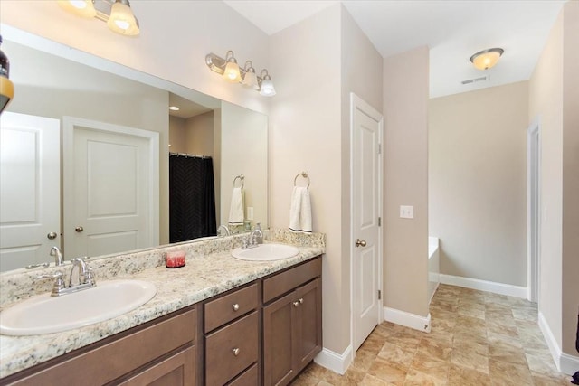 3028 Honeysuckle Dr, Spring Hill, TN 37174 - full bath with double vanity and a bath