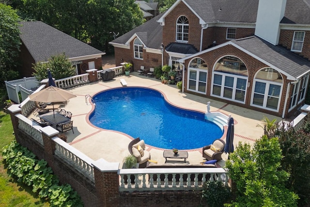 2208 Chadwick Ct, Mount Juliet, TN 37122 - swimming pool featuring a patio and an outdoor living space