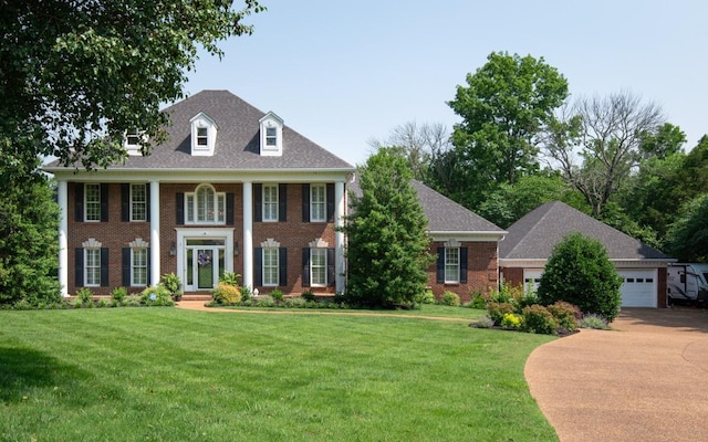 2208 Chadwick Ct, Mount Juliet, TN 37122 - view of front of house with brick siding, a front lawn, and a garage