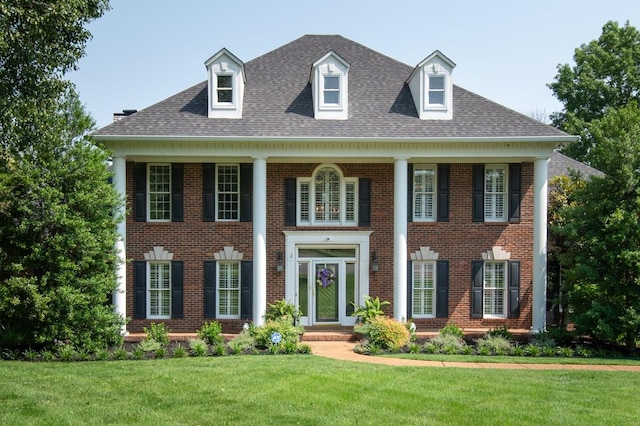 2208 Chadwick Ct, Mount Juliet, TN 37122 - view of front of house with brick siding, a front lawn, and roof with shingles
