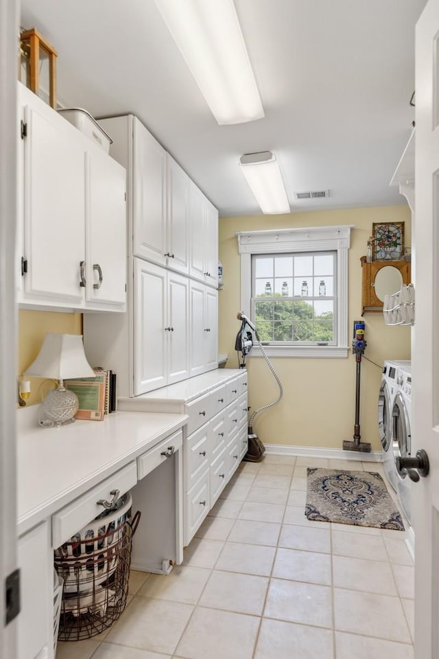 2208 Chadwick Ct, Mount Juliet, TN 37122 - washroom featuring cabinet space, separate washer and dryer, and light tile patterned floors
