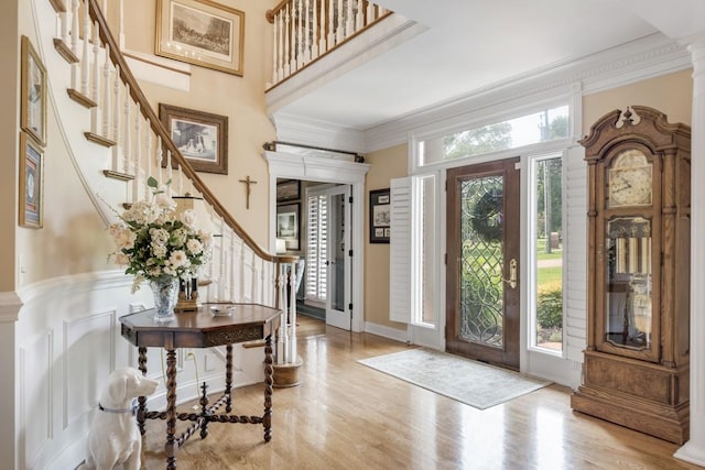 2208 Chadwick Ct, Mount Juliet, TN 37122 - entryway featuring stairs, plenty of natural light, wood finished floors, ornamental molding, and ornate columns