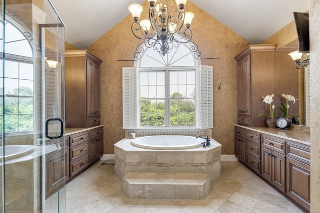 2208 Chadwick Ct, Mount Juliet, TN 37122 - full bath featuring vaulted ceiling, plenty of natural light, a chandelier, and a garden tub