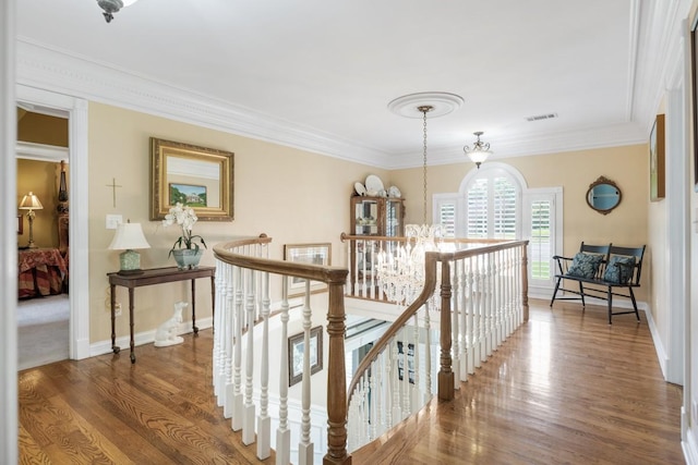 2208 Chadwick Ct, Mount Juliet, TN 37122 - hallway featuring an upstairs landing, wood finished floors, and ornamental molding