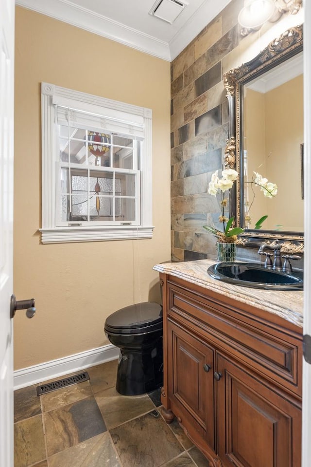2208 Chadwick Ct, Mount Juliet, TN 37122 - half bathroom with crown molding, vanity, and stone finish floors