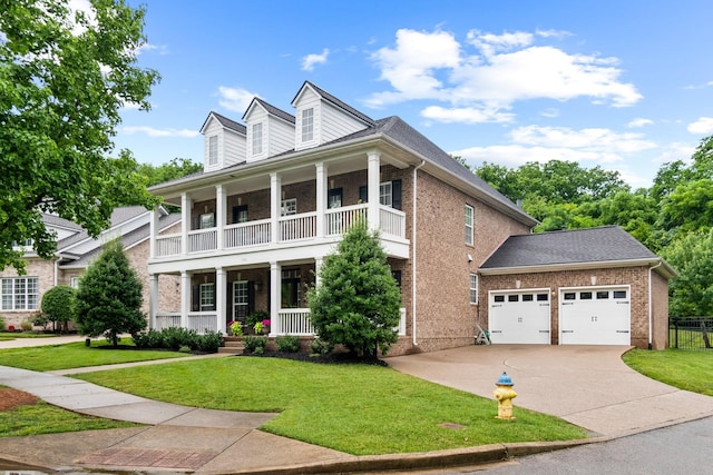 368 Pennystone Cir, Franklin, TN 37067 - view of front of property with a porch, a balcony, and brick siding