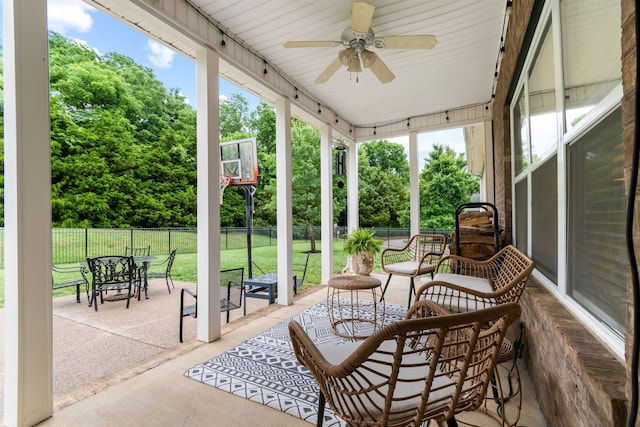 368 Pennystone Cir, Franklin, TN 37067 - sunroom / solarium with a ceiling fan and view of wooded area