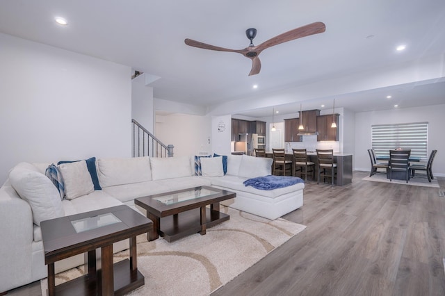 1401 Kennebec Dr, Smyrna, TN 37167 - living area featuring a ceiling fan, light wood-style floors, stairs, and recessed lighting