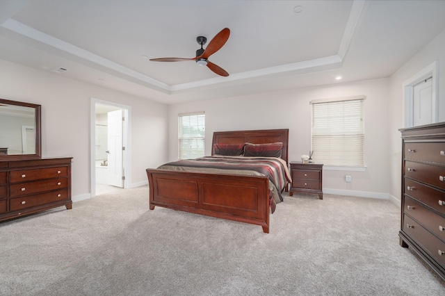 1401 Kennebec Dr, Smyrna, TN 37167 - bedroom featuring a tray ceiling, light carpet, ceiling fan, and connected bathroom
