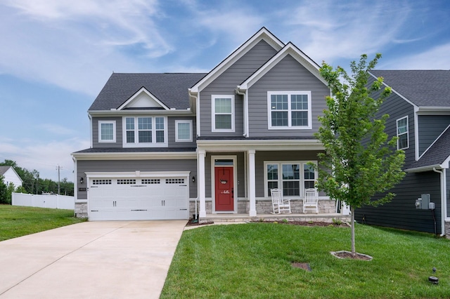 1401 Kennebec Dr, Smyrna, TN 37167 - craftsman house featuring covered porch, concrete driveway, an attached garage, and stone siding