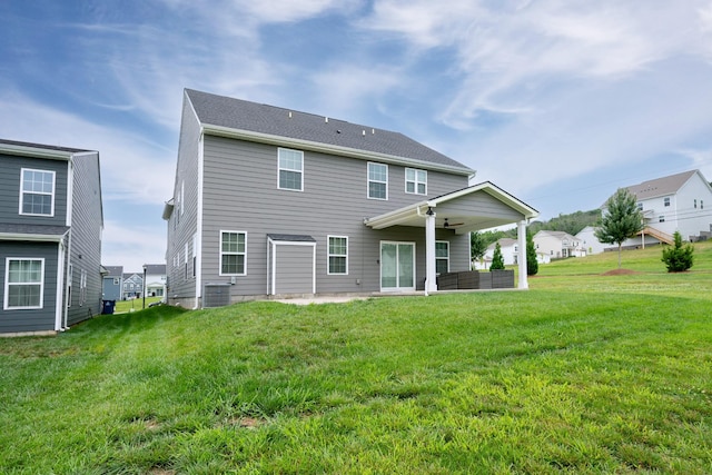 1401 Kennebec Dr, Smyrna, TN 37167 - back of property with a patio area, a ceiling fan, and a lawn