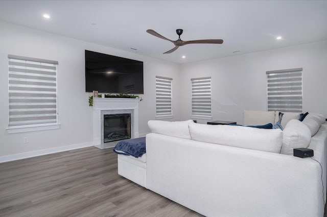 1401 Kennebec Dr, Smyrna, TN 37167 - living room with ceiling fan, wood finished floors, a premium fireplace, and recessed lighting