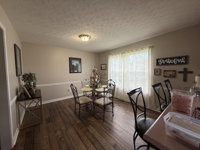 242 Kay Cir, Lafayette, TN 37083 - dining area with dark wood finished floors and a textured ceiling