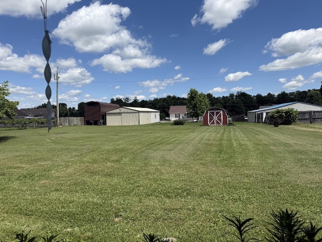 242 Kay Cir, Lafayette, TN 37083 - view of green lawn featuring a shed