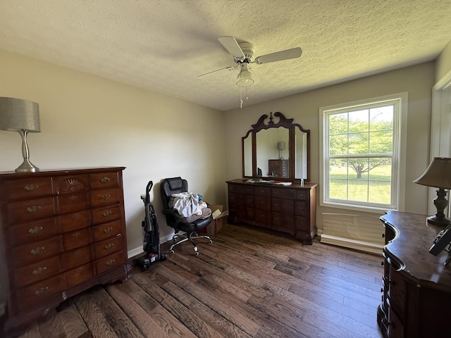 242 Kay Cir, Lafayette, TN 37083 - office space with dark wood-type flooring, ceiling fan, and a textured ceiling