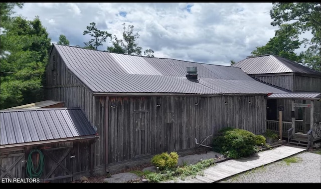 329 Wheeler Ln, Jamestown, TN 38556 - rear view of property featuring a metal roof