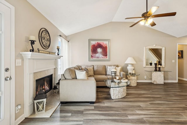 1652 Saint Andrews Dr, Murfreesboro, TN 37128 - living room featuring wood finished floors, lofted ceiling, a ceiling fan, and a tile fireplace