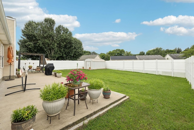 1652 Saint Andrews Dr, Murfreesboro, TN 37128 - fenced backyard with a patio area and a storage unit