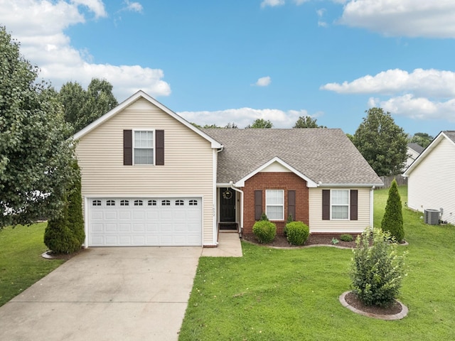 1652 Saint Andrews Dr, Murfreesboro, TN 37128 - traditional-style home featuring concrete driveway, an attached garage, a front lawn, and brick siding