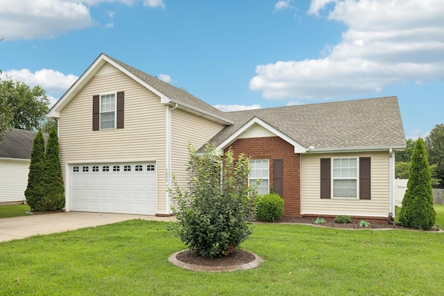 1652 Saint Andrews Dr, Murfreesboro, TN 37128 - traditional-style home featuring driveway, a garage, roof with shingles, a front yard, and brick siding