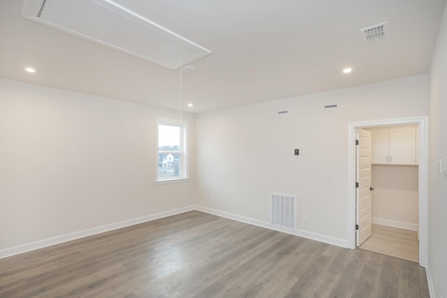 3294 Camden Ct, Mount Juliet, TN 37122 - unfurnished room with attic access, wood finished floors, and recessed lighting