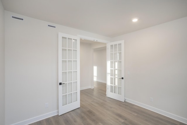 3294 Camden Ct, Mount Juliet, TN 37122 - spare room featuring french doors, wood finished floors, and recessed lighting
