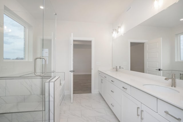 3294 Camden Ct, Mount Juliet, TN 37122 - full bathroom with marble look tile flooring, double vanity, a bath, and a shower stall