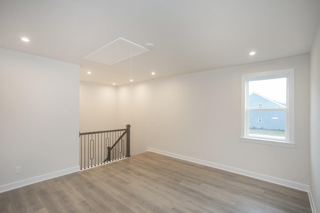 3294 Camden Ct, Mount Juliet, TN 37122 - spare room with attic access, wood finished floors, and recessed lighting