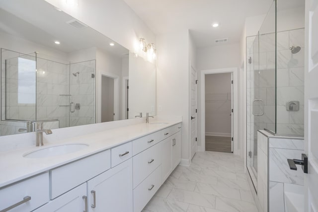 3294 Camden Ct, Mount Juliet, TN 37122 - bathroom with marble look tile flooring, double vanity, a stall shower, a spacious closet, and recessed lighting