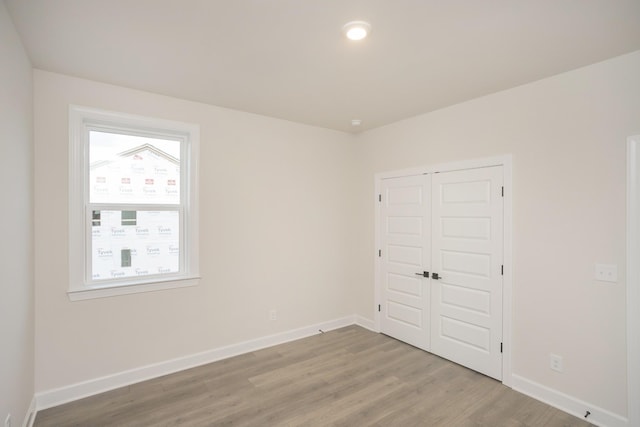 3294 Camden Ct, Mount Juliet, TN 37122 - unfurnished bedroom featuring wood finished floors and a closet