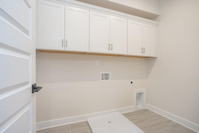 3294 Camden Ct, Mount Juliet, TN 37122 - washroom featuring cabinet space, hookup for an electric dryer, washer hookup, and light wood finished floors