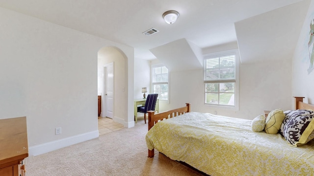 166 Azalea Ln, Franklin, TN 37064 - bedroom featuring arched walkways and light colored carpet
