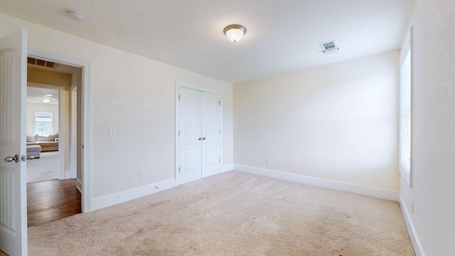 166 Azalea Ln, Franklin, TN 37064 - unfurnished bedroom featuring carpet floors and a closet