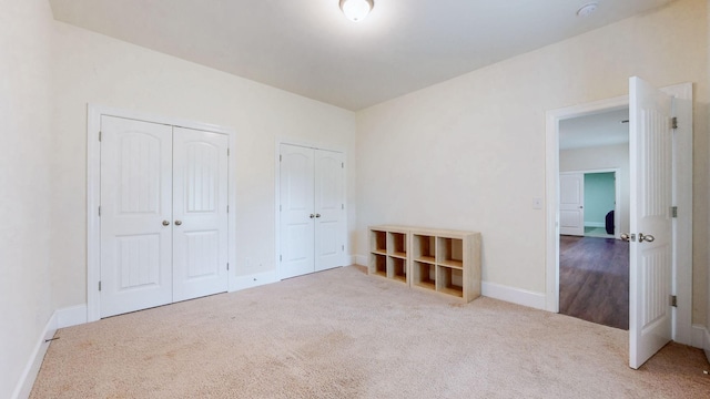 166 Azalea Ln, Franklin, TN 37064 - unfurnished bedroom with two closets and carpet floors