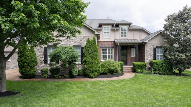 166 Azalea Ln, Franklin, TN 37064 - view of front of home with stone siding, stucco siding, a front lawn, and a shingled roof