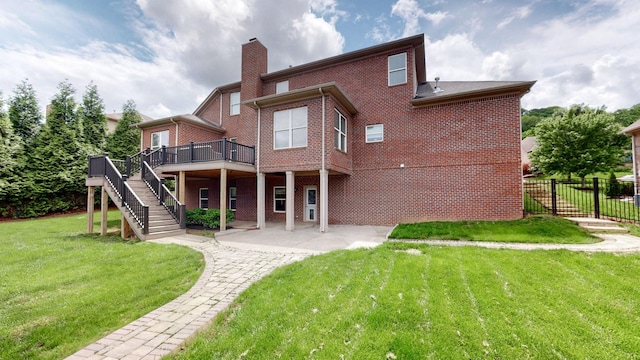 166 Azalea Ln, Franklin, TN 37064 - back of property with stairs, a wooden deck, brick siding, a patio, and a chimney