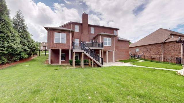 166 Azalea Ln, Franklin, TN 37064 - back of property with stairs, a chimney, a deck, brick siding, and a patio