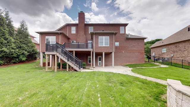 166 Azalea Ln, Franklin, TN 37064 - back of house with a deck, stairway, a chimney, a patio, and brick siding