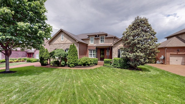 166 Azalea Ln, Franklin, TN 37064 - view of front of home featuring a front yard, stone siding, and brick siding