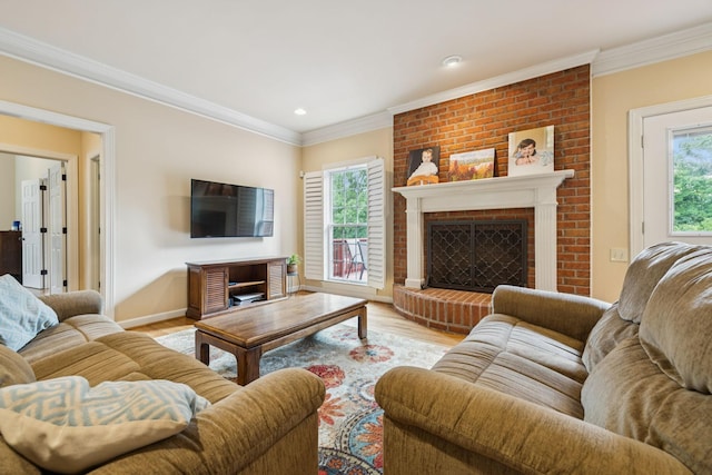 410 Ridge View Ct, Franklin, TN 37067 - living area with wood finished floors, a brick fireplace, crown molding, and recessed lighting