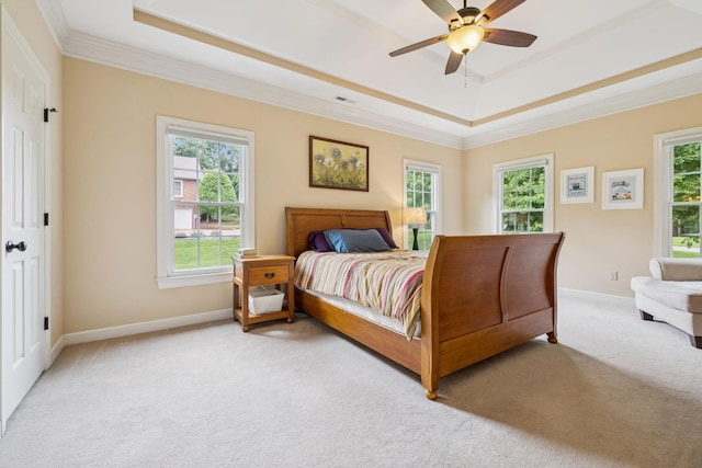 410 Ridge View Ct, Franklin, TN 37067 - bedroom with a tray ceiling, light carpet, ornamental molding, and ceiling fan